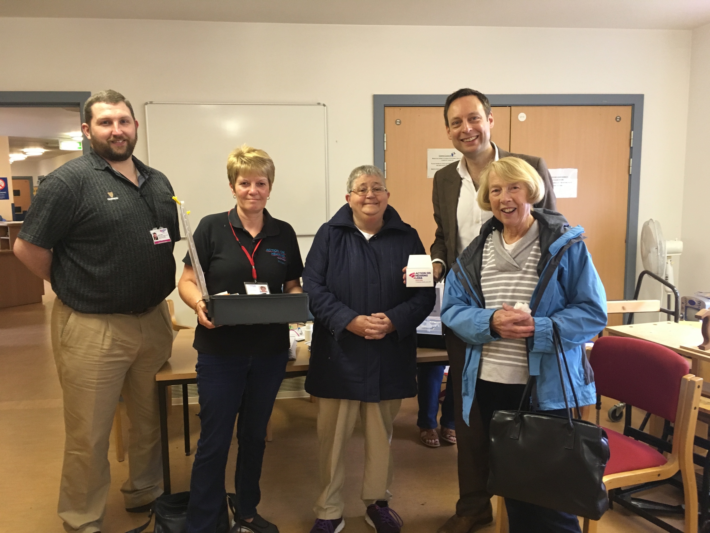 Mr Kerr with service users at volunteers in Forfar.