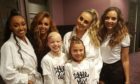 Lily Douglas with her friend Cerys Robertson and Little Mix.