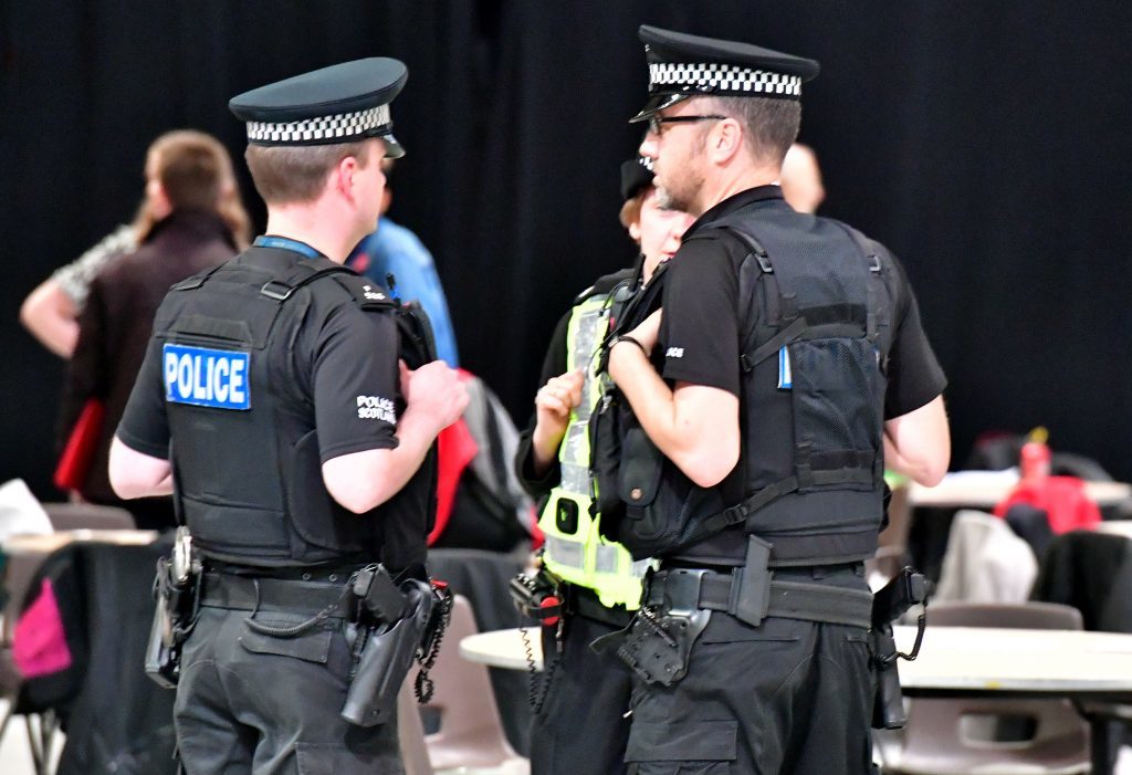 Armed Police at the count. in Aberdeen.