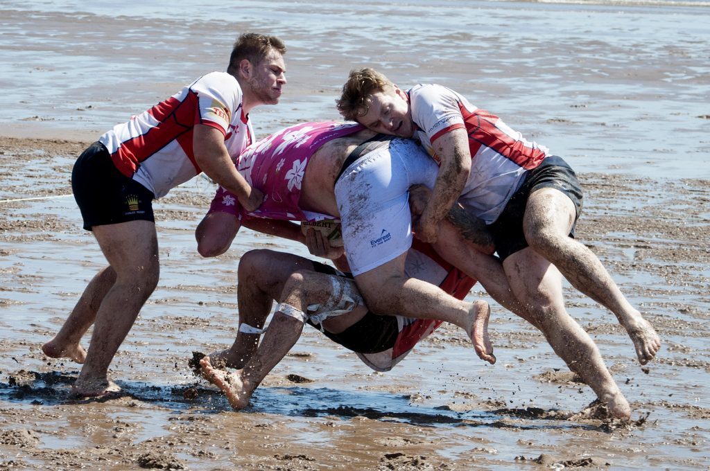 teams compete at the Carnoustie Beach Rugby Anniversary Celebrations.