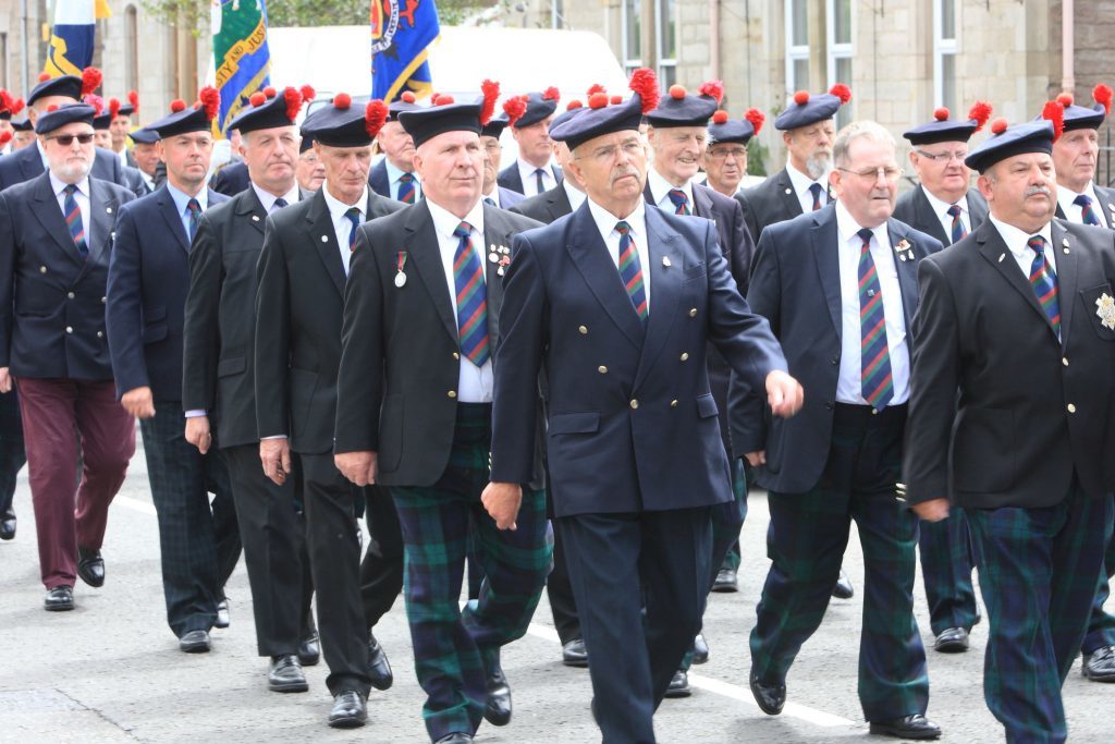Black Watch veterans march to Balhousie Castle in Perth after watching the unveiling.