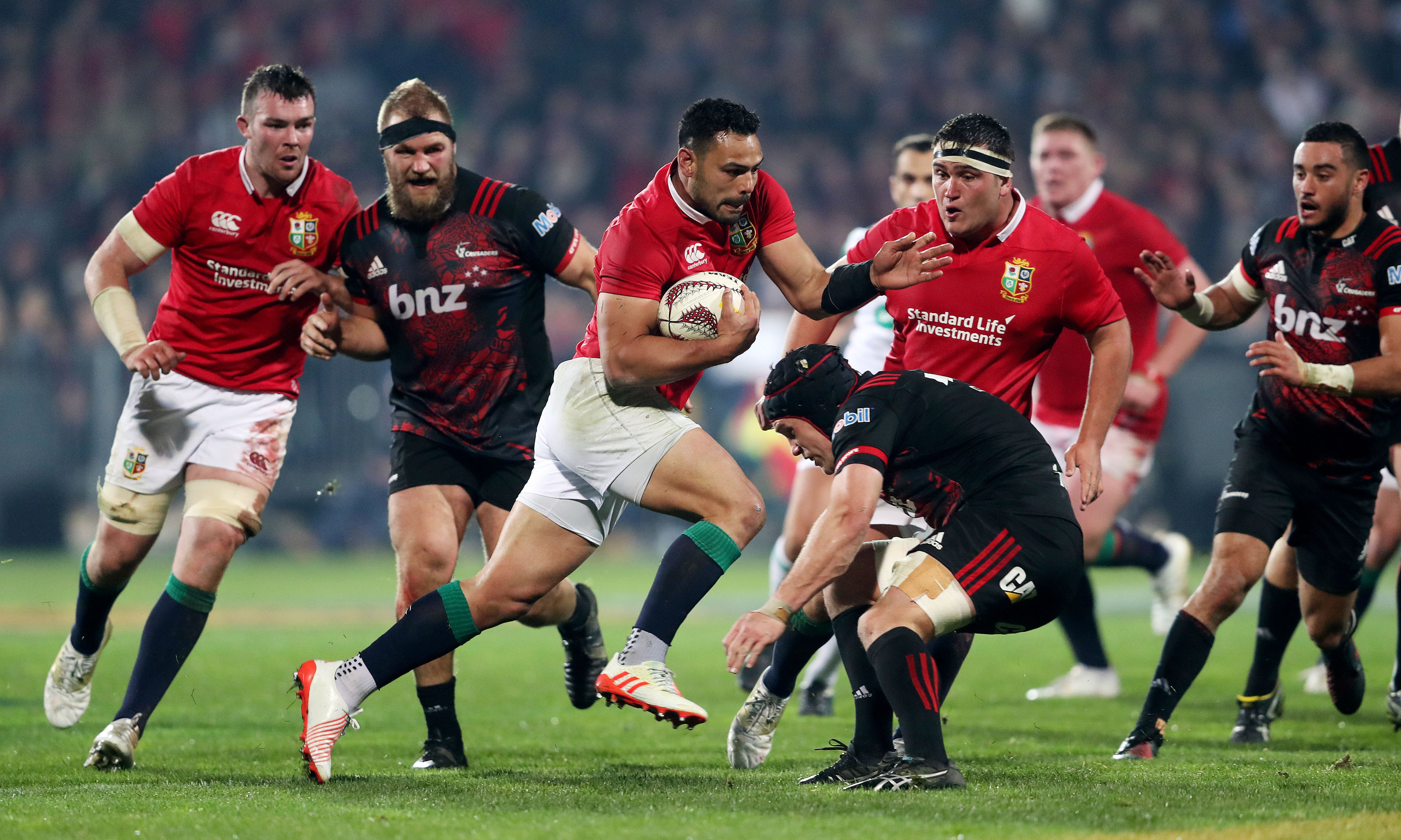 Ben Te'o of the Lions carries hard in the win over the Crusaders in Christchurch.