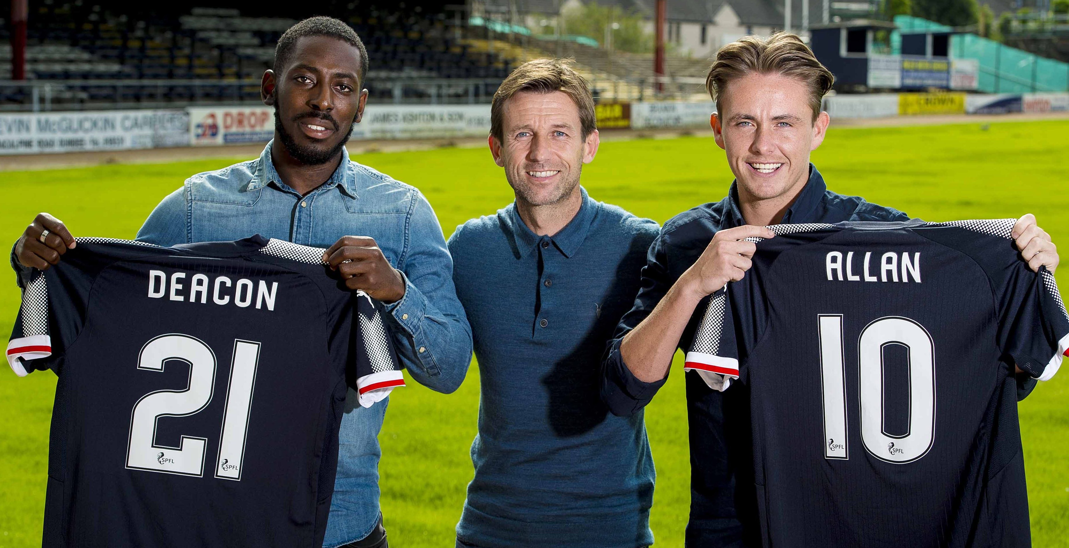 Neil McCann flanked by his two new signings.