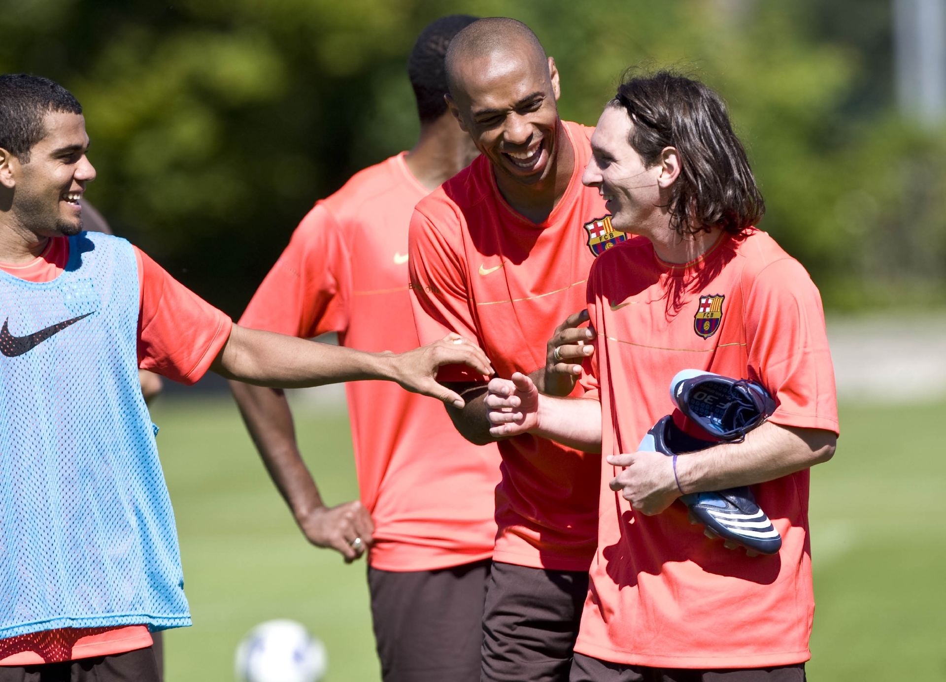 Barcelona stars Thierry Henry and Lionel Messi with Dani Alves at St Andrews in July 2008.