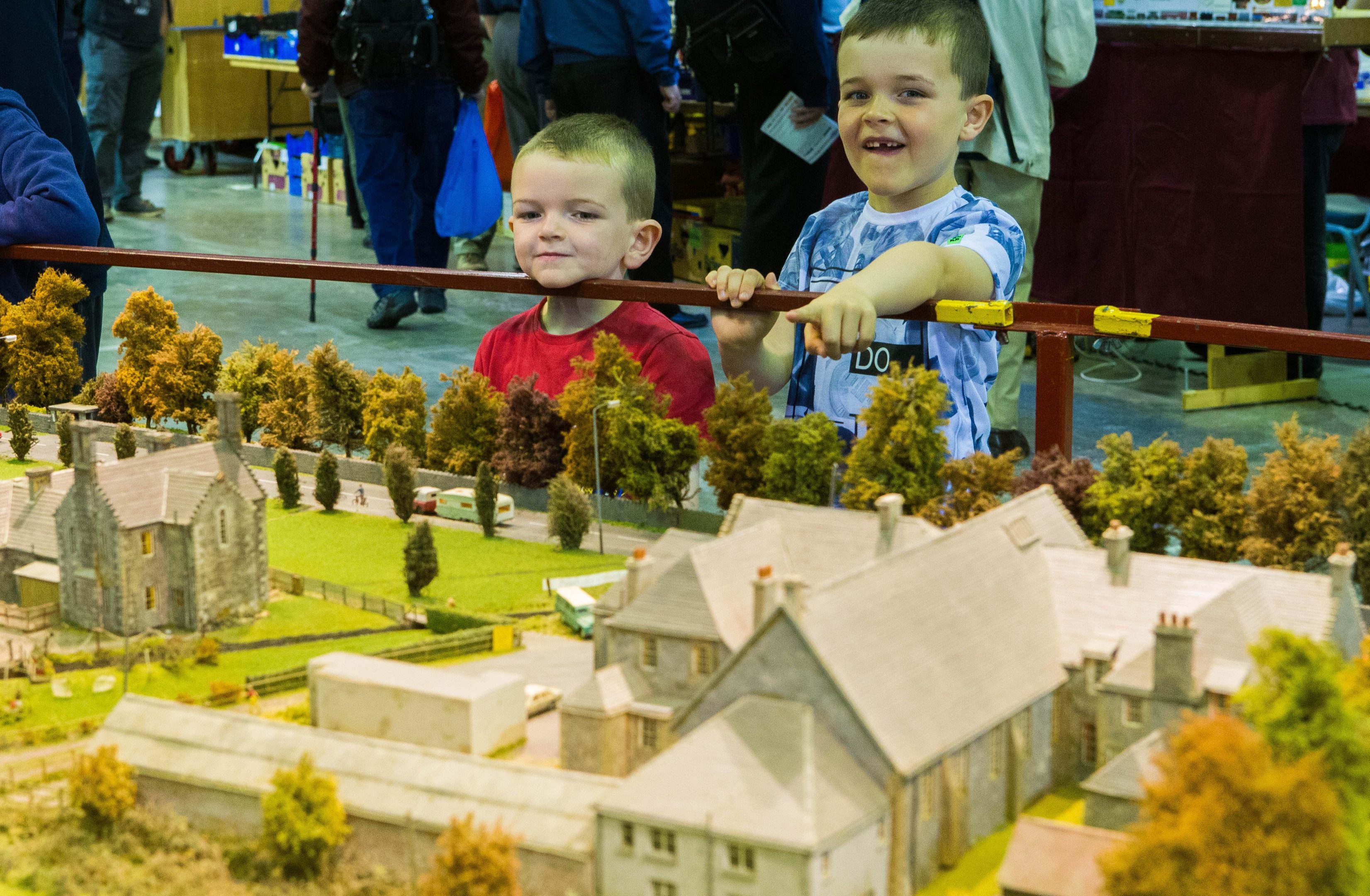 Conlan Turner (5) is shown the Blair Atholl rail model by brother Bryn Turner (6).