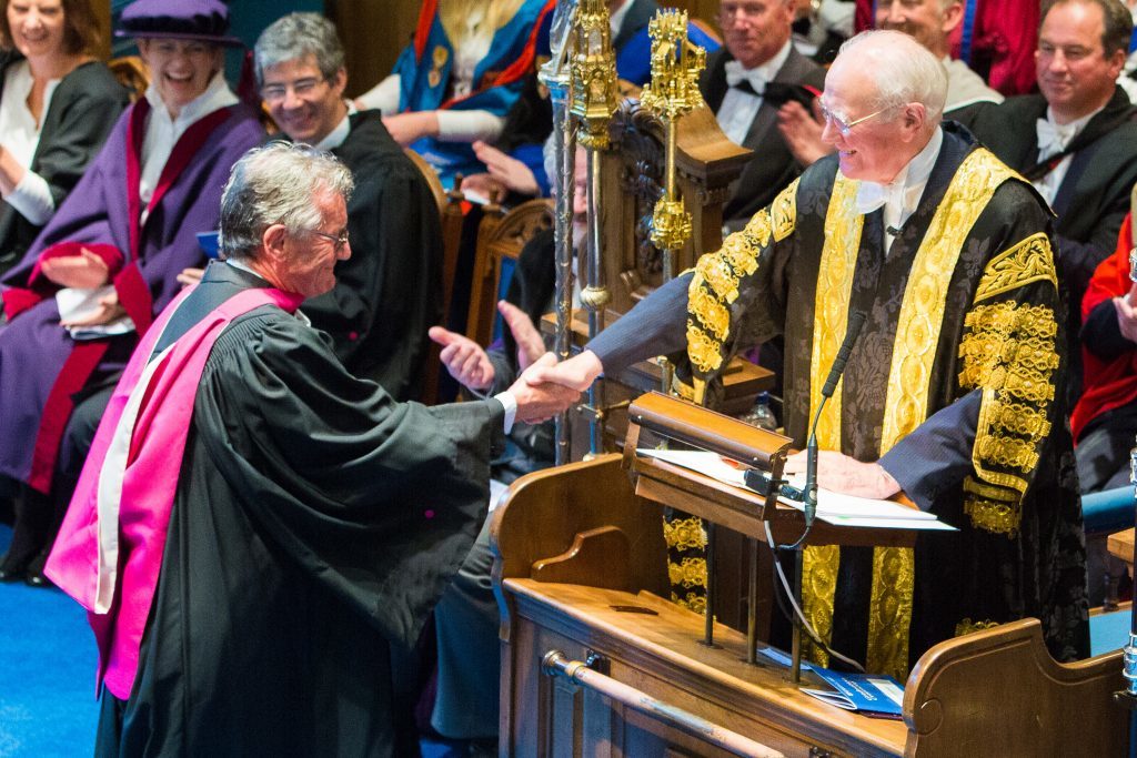Michael Palin receives his Honorary Degree of Doctor of Science at St Andrews University, presented by Lord Campbell and Professor William Auston.