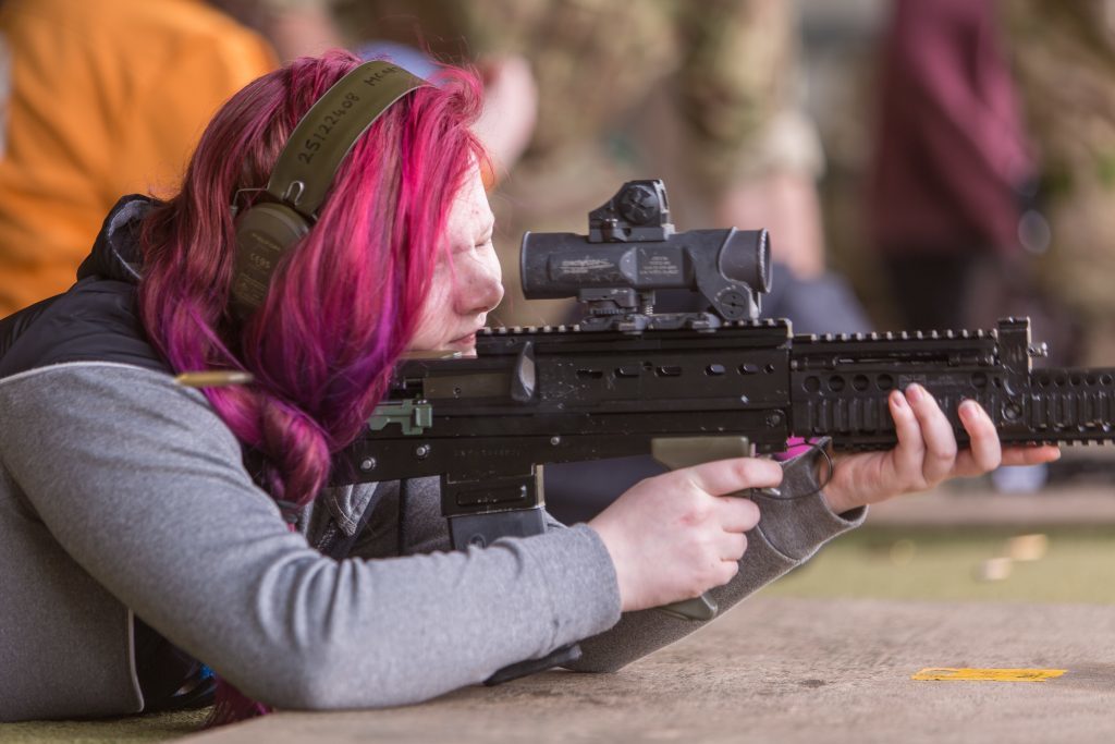 Mirren Thomson (14) is shown how to fire the SA80 rifle.