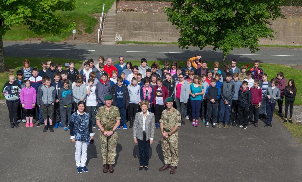 Angus School children with Royal Marine Commandoes and Angus Lord Lieutenant Georgiana Osborne.