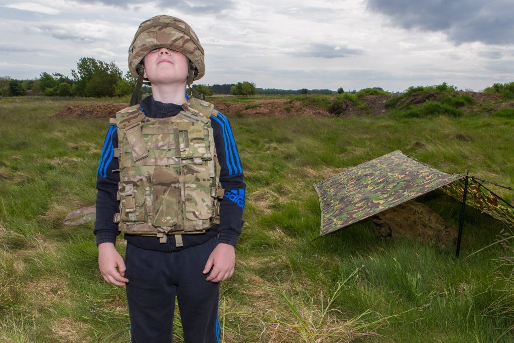 Brodie Allan (12) from Forfar Academy in body armour.