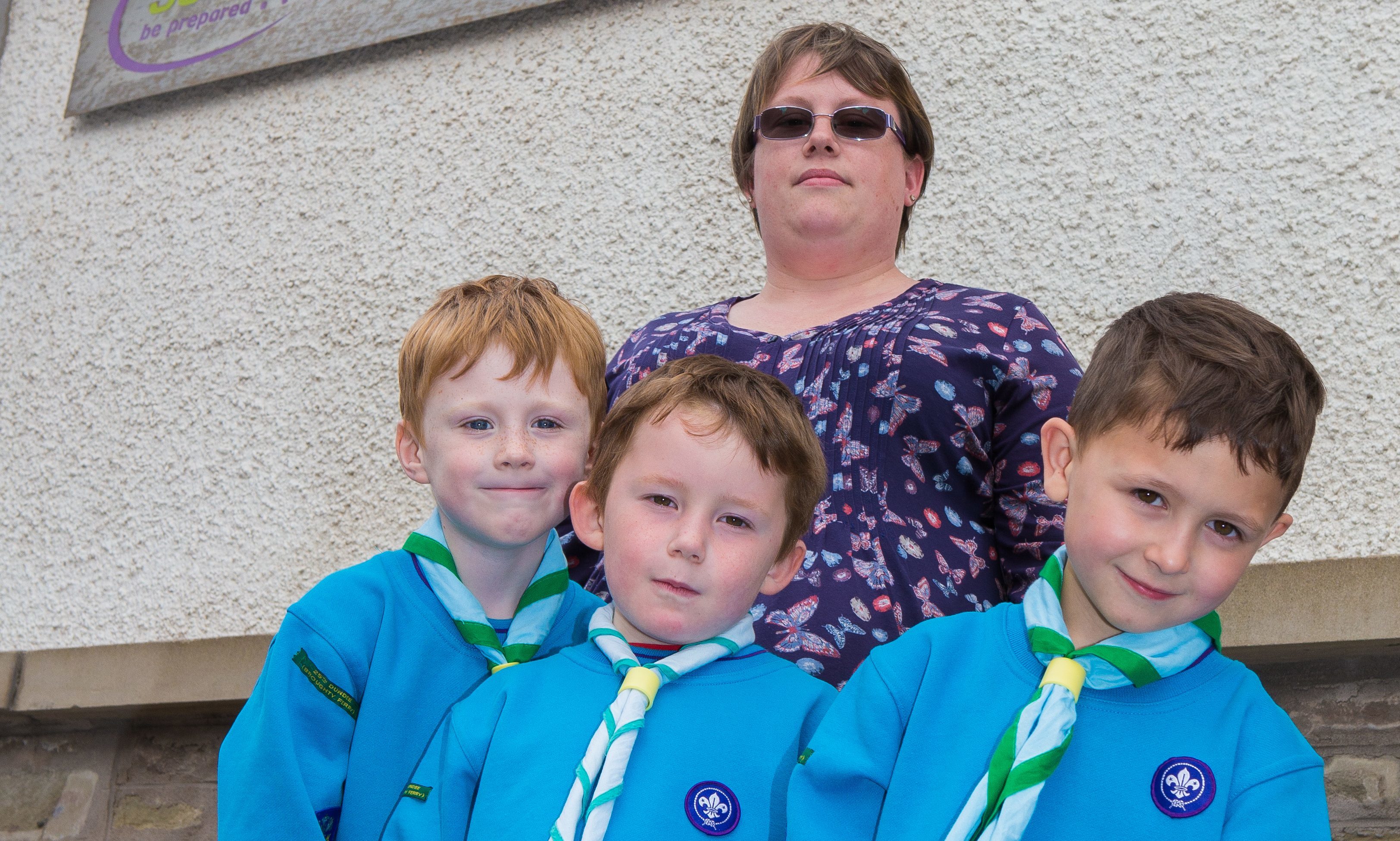 Gemma Reid with some of the young members of the 25th group.