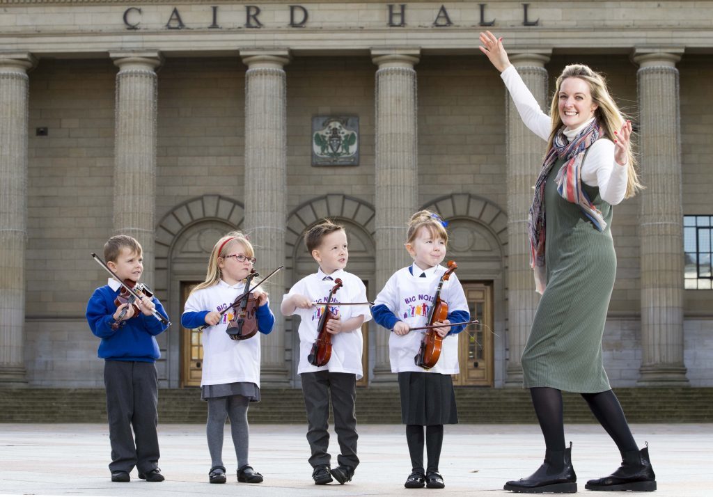 Ryan Mackenzie, Bella Riddell, Rhylee Traynor and Caitlyn Bertie with Sistema Scotland chief executive Nicola Keillan in May