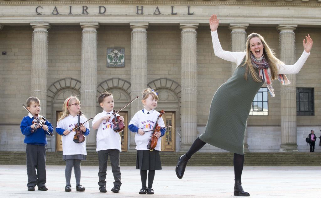 The launch of Big Noise Douglas took a major forward in May with the signing of the official partnership agreement between Sistema Scotland, Optimistic Sound and Dundee City Council. 
Ryan Mackenzie, Bella Riddell, Rhylee Traynor and Caitlyn Bertie are pictured with Sistema Scotland chief executive Nicola Killean