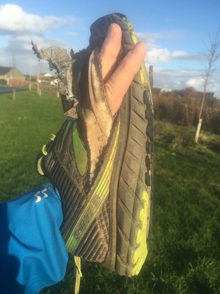 Simon's first pair of trainers, which were run-through after 881 miles.