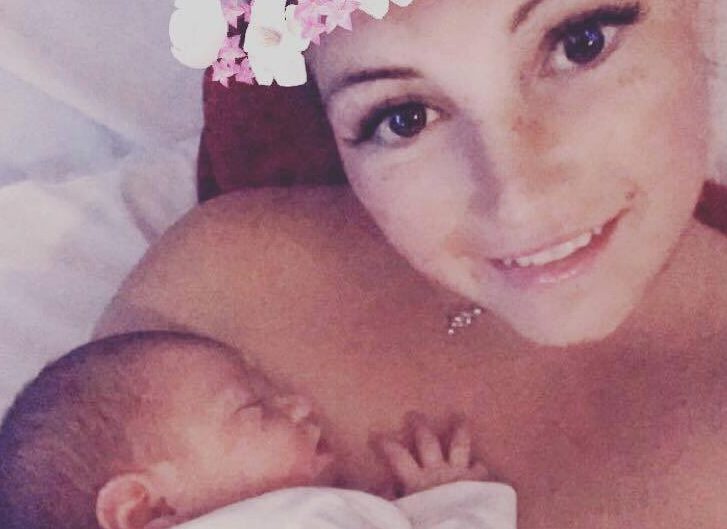 April Oliver posted a photo of her holding the baby online.