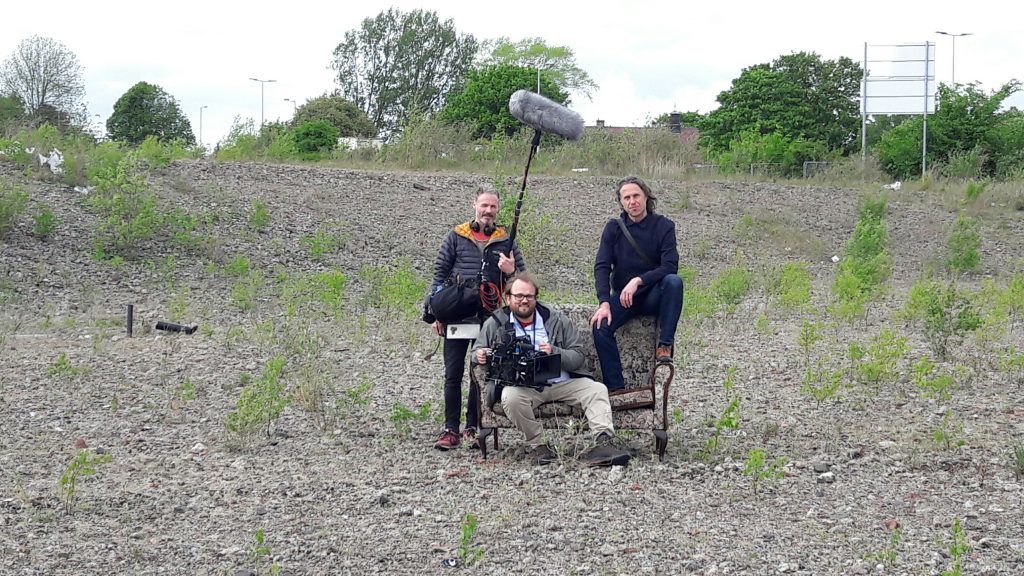 Soundman Cammy Mercer, cameraman Julian Schwanitz and director Martin Smith on the waste ground at Kingsway East