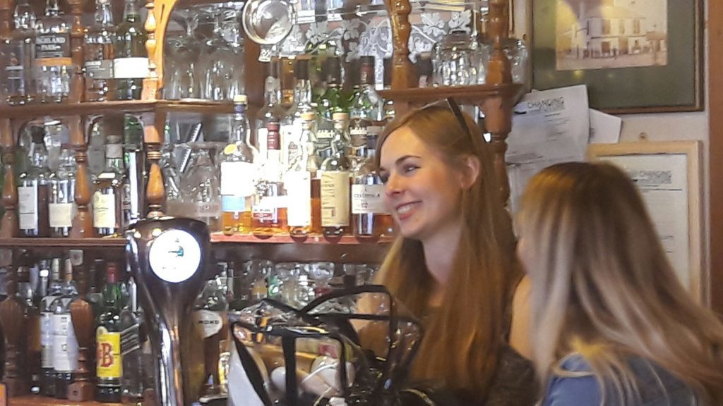 Stylist Zoe Radcliffe (left) and hair stylist Gillian Ball share a joke behind the scenes