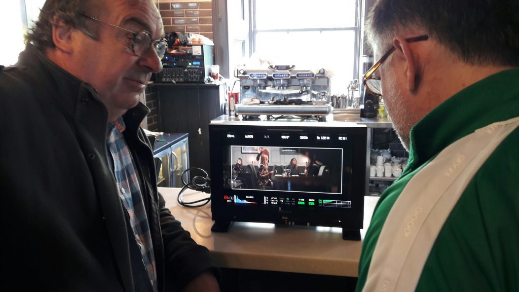 Executive producer George Barr and prop sourcer Fred Macmillan check the frame for unwanted items before a shot is even filmed