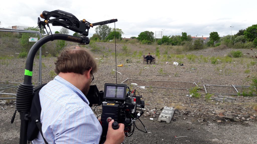 Filming on waste ground at Kingsway East, Dundee