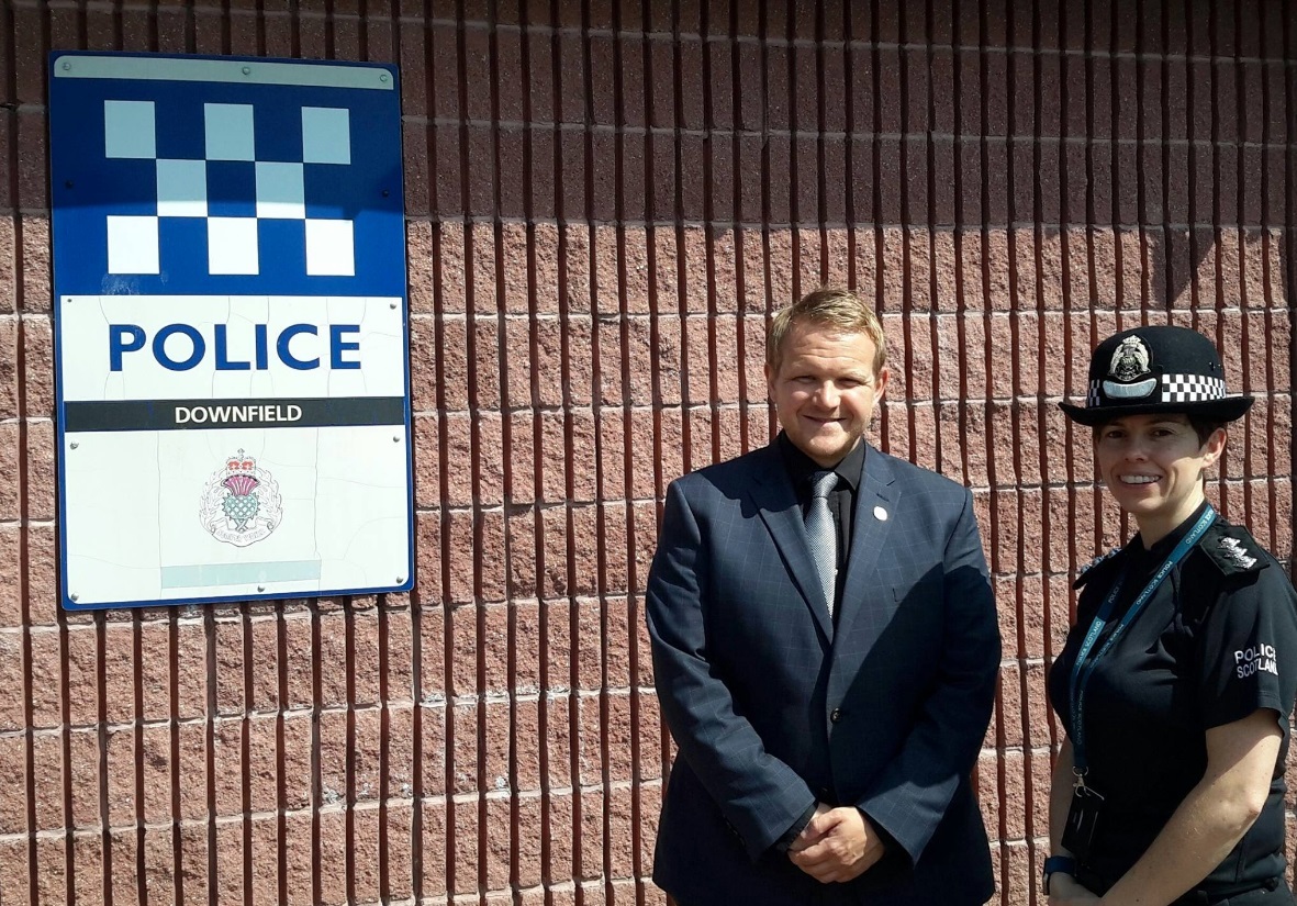 Mr Ross, pictured with area commander Nicola Russell, wants to ensure people know Dundee's streets are safe.