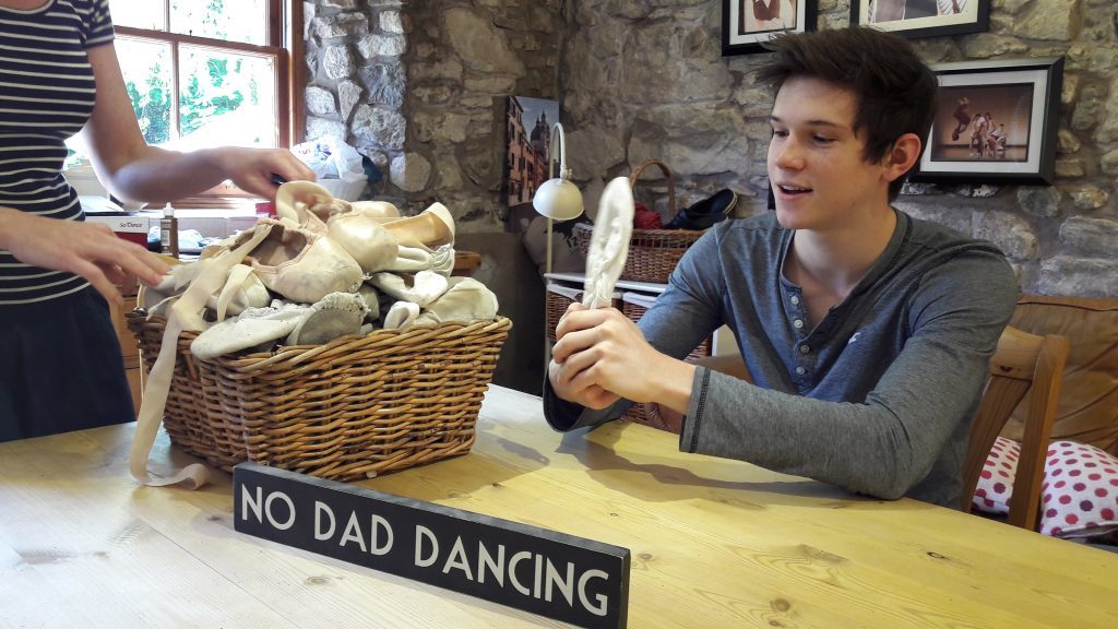 Harris Bell having a bit of fun with some old ballet shoes at home