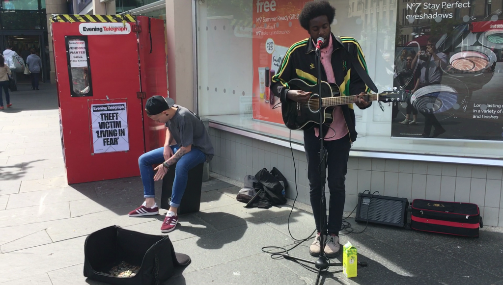 Brandyn Murphy and singer-guitarist James Liandu in Dundee City Centre.