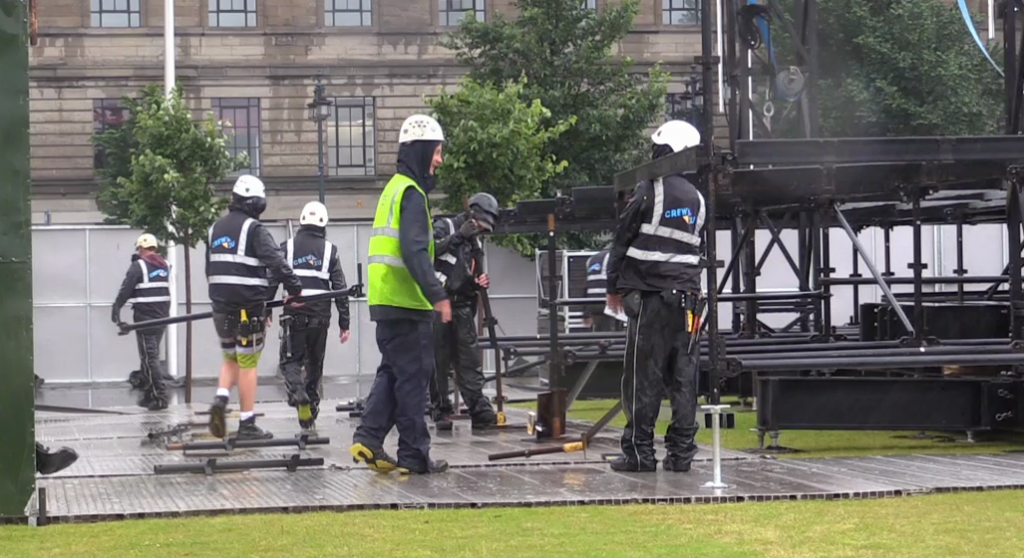 Workers setting up the stage on Dundee waterfront