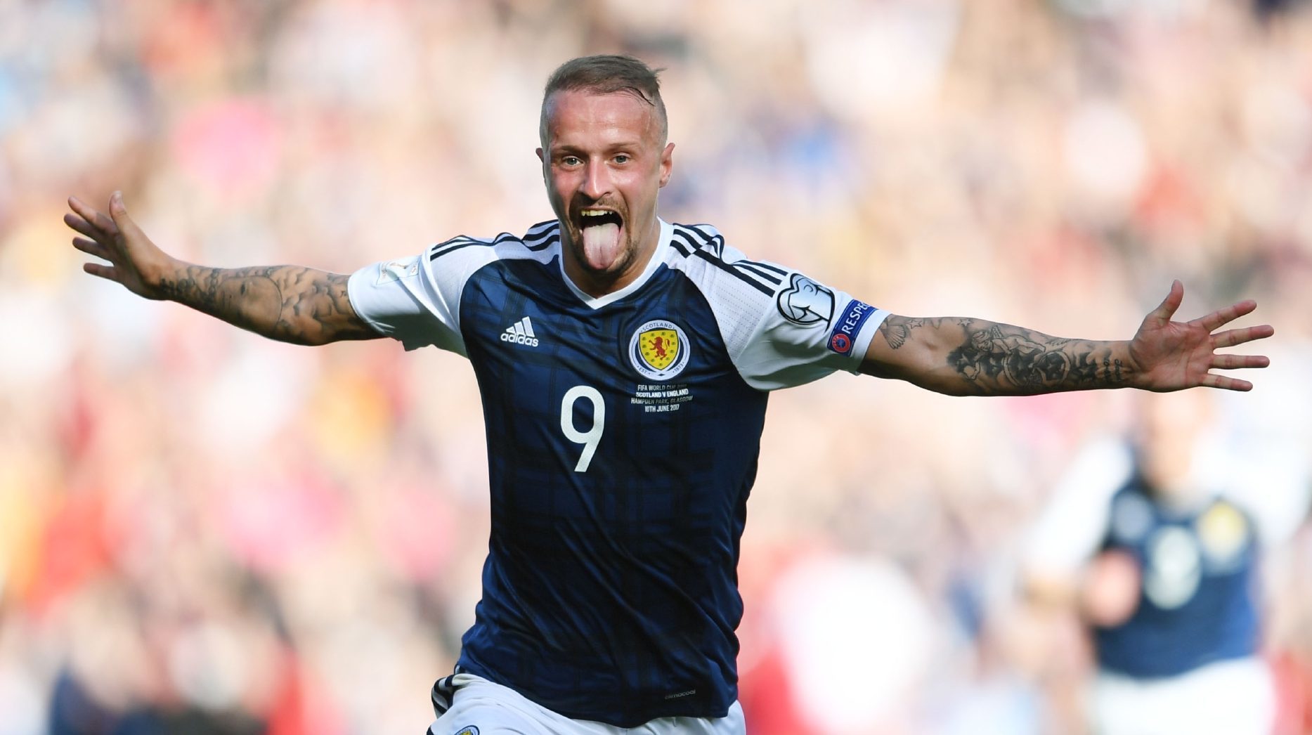 Leigh Griffiths celebrates scoring his second freekick.