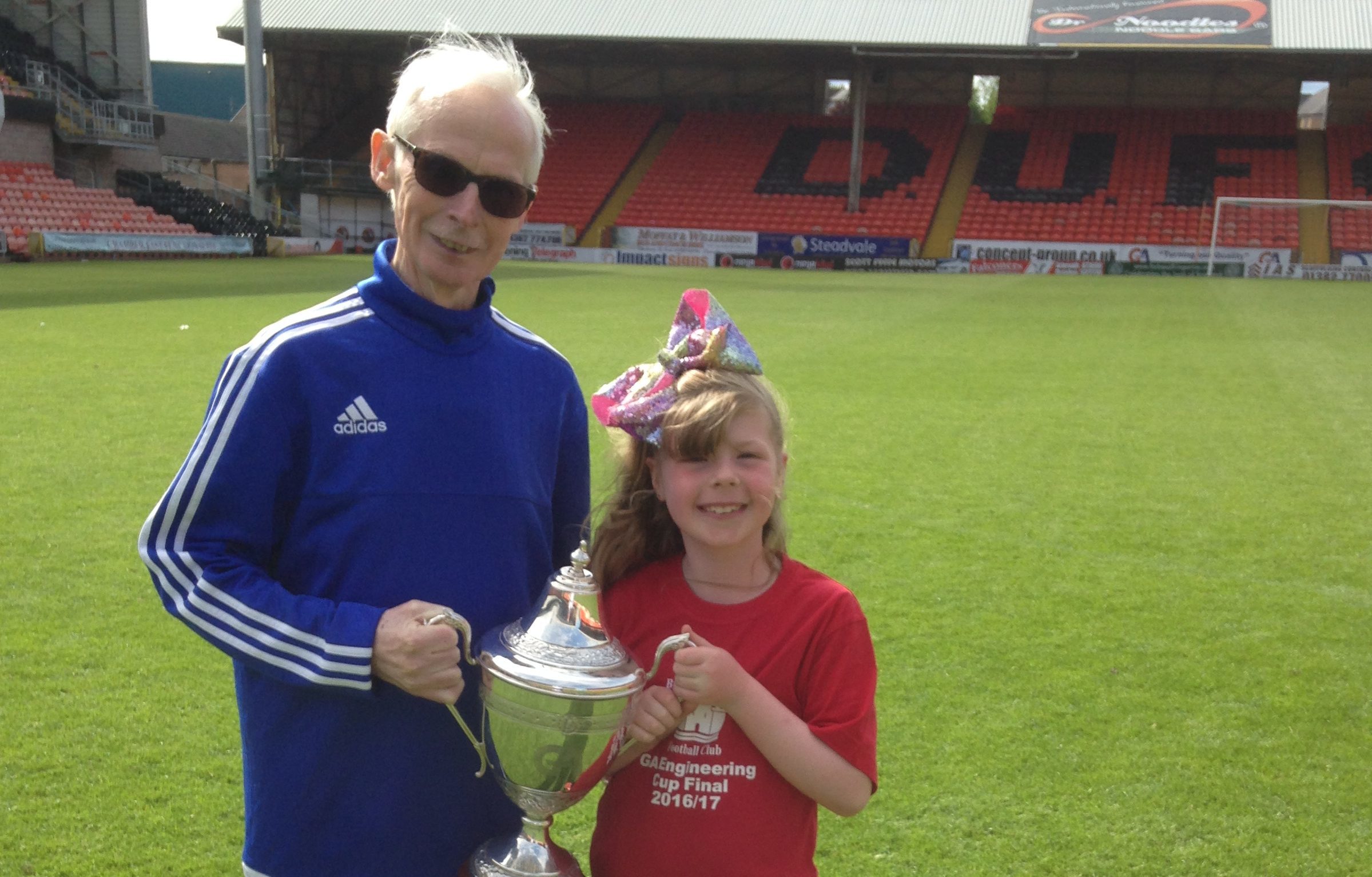 Sandy with his grand-daughter Alix at Tannadice.