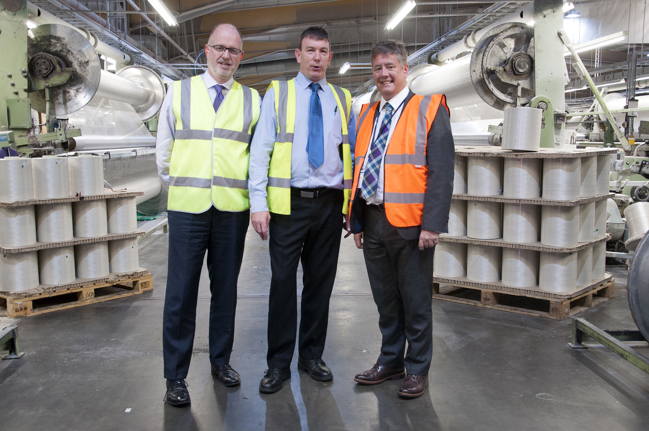 From left — managing director Mark Newstead, general manager of technical textiles John Hughes, and MSP Keith Brown