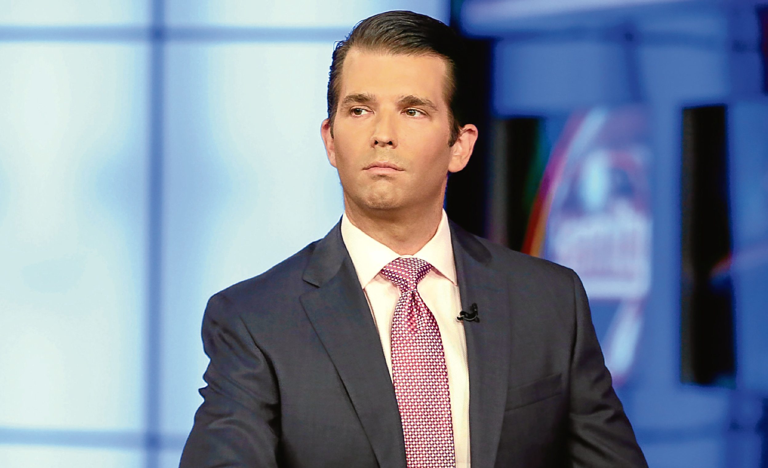 Donald Trump Jr is interviewed by host Sean Hannity on the Fox News Channel television program.