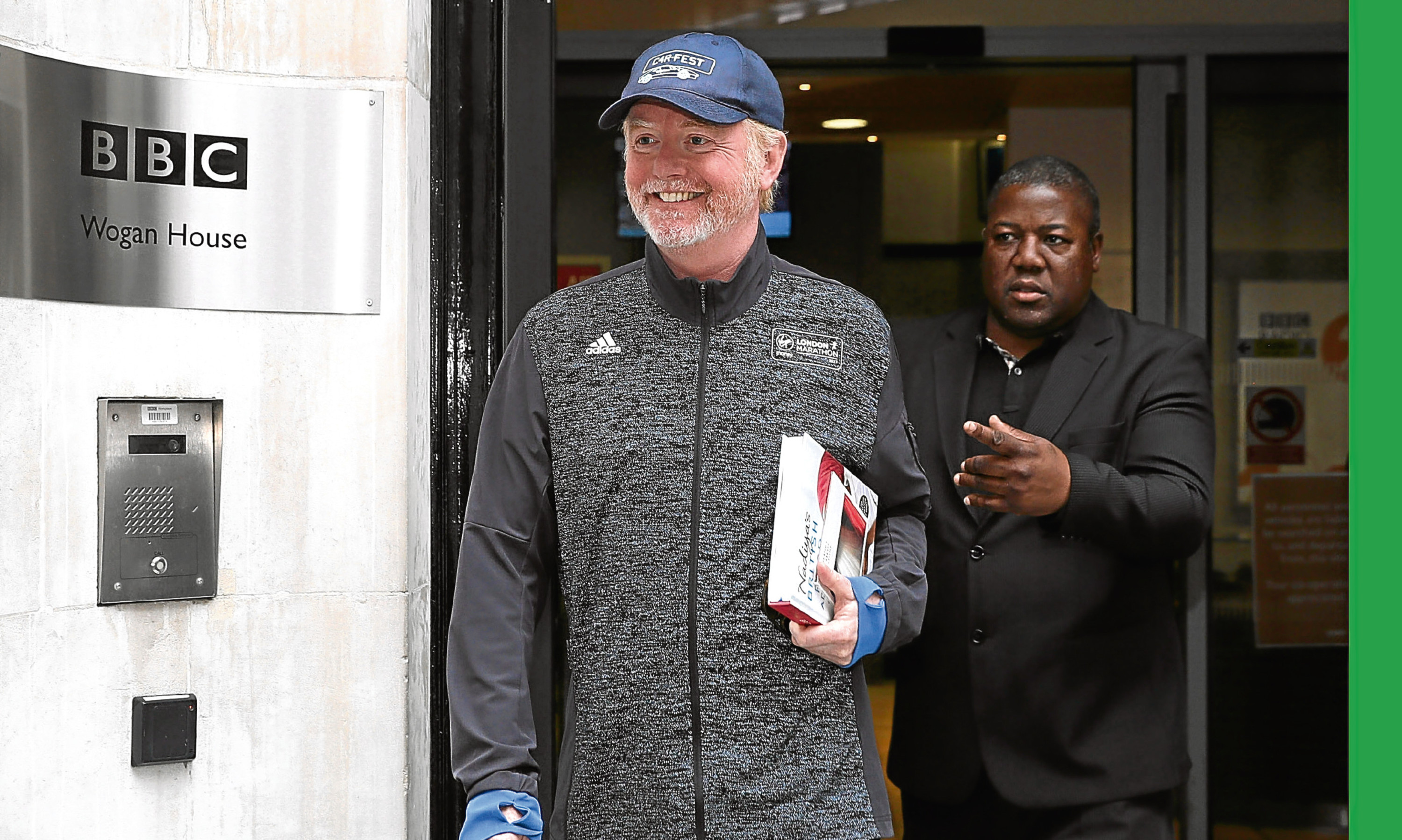 Chris Evans leaves the BBC’s Wogan House after his pay was revealed.