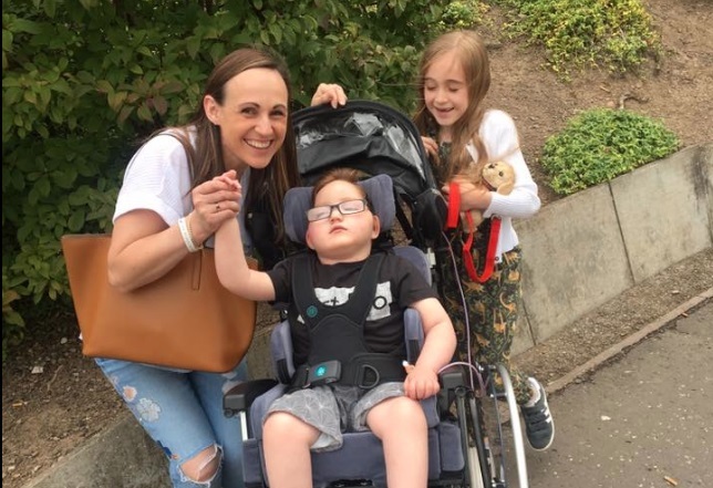 Blake returning home with his mum Jenny and sister Faye.