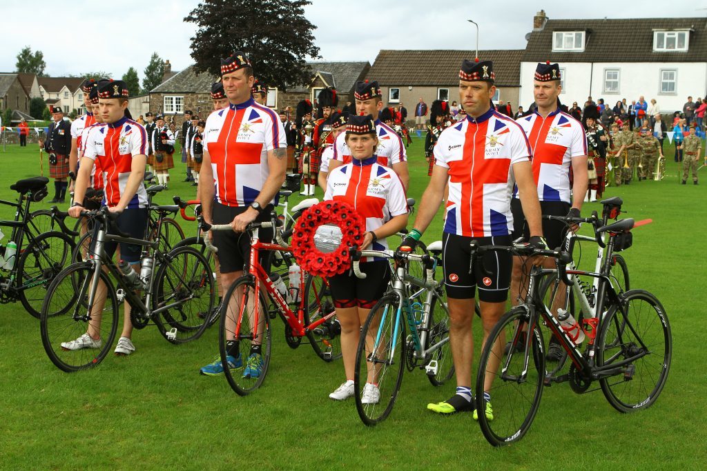 Picture shows; the cyclists who cycled from Crieff to Passchendaele in Market park, at the parade and Drumhead Service to mark the 100th anniversary of the Battle of Passchendaele, in Crieff today. Sunday 30th July 2017.