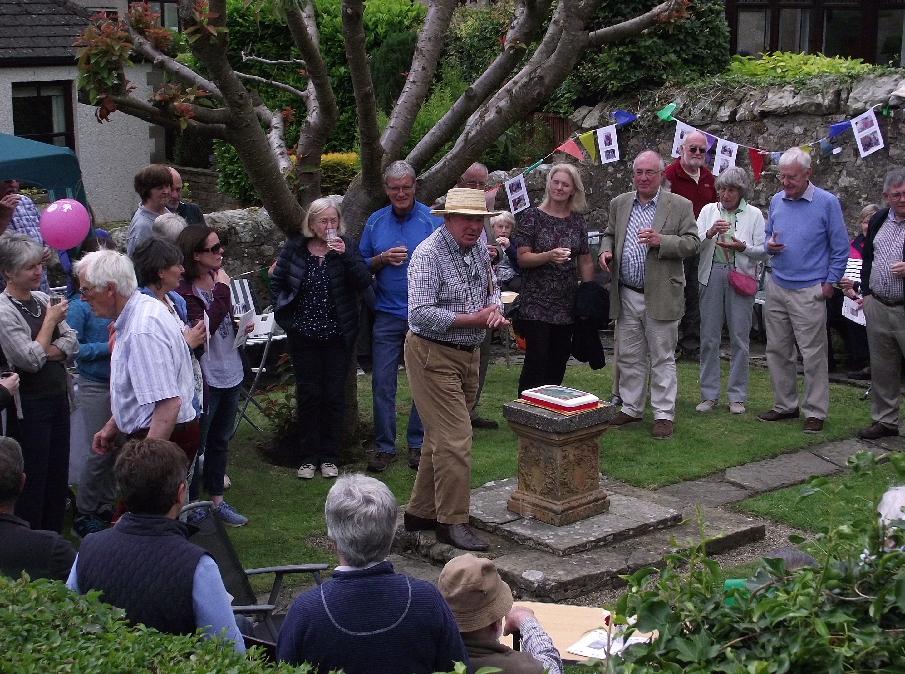 Dr David Munro MBE, chairman of the Michael Bruce Trust welcomes guests to the garden party.