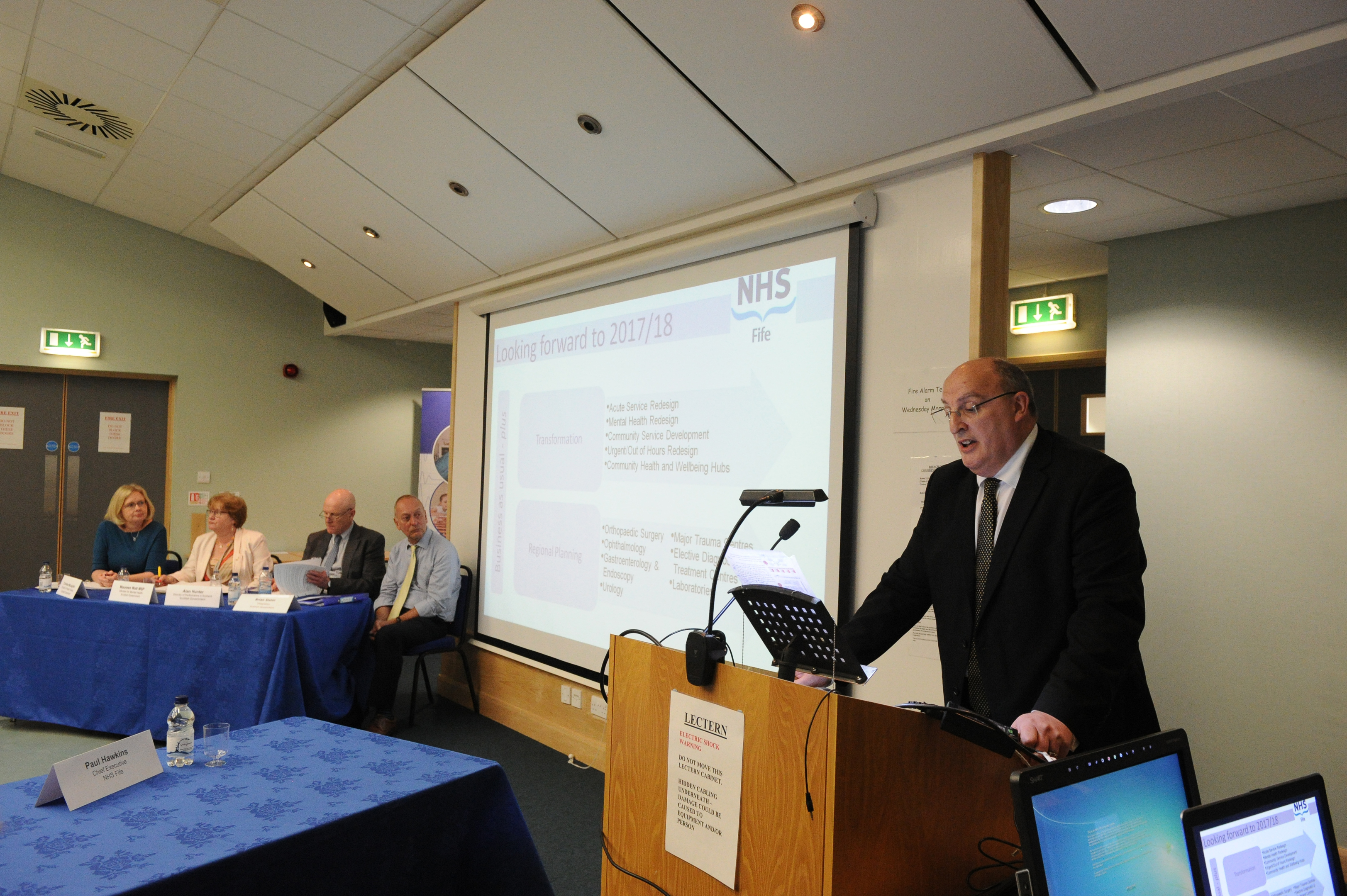 NHS Fife chief executive Paul Hawkins addresses the assembled audience at the annual review.