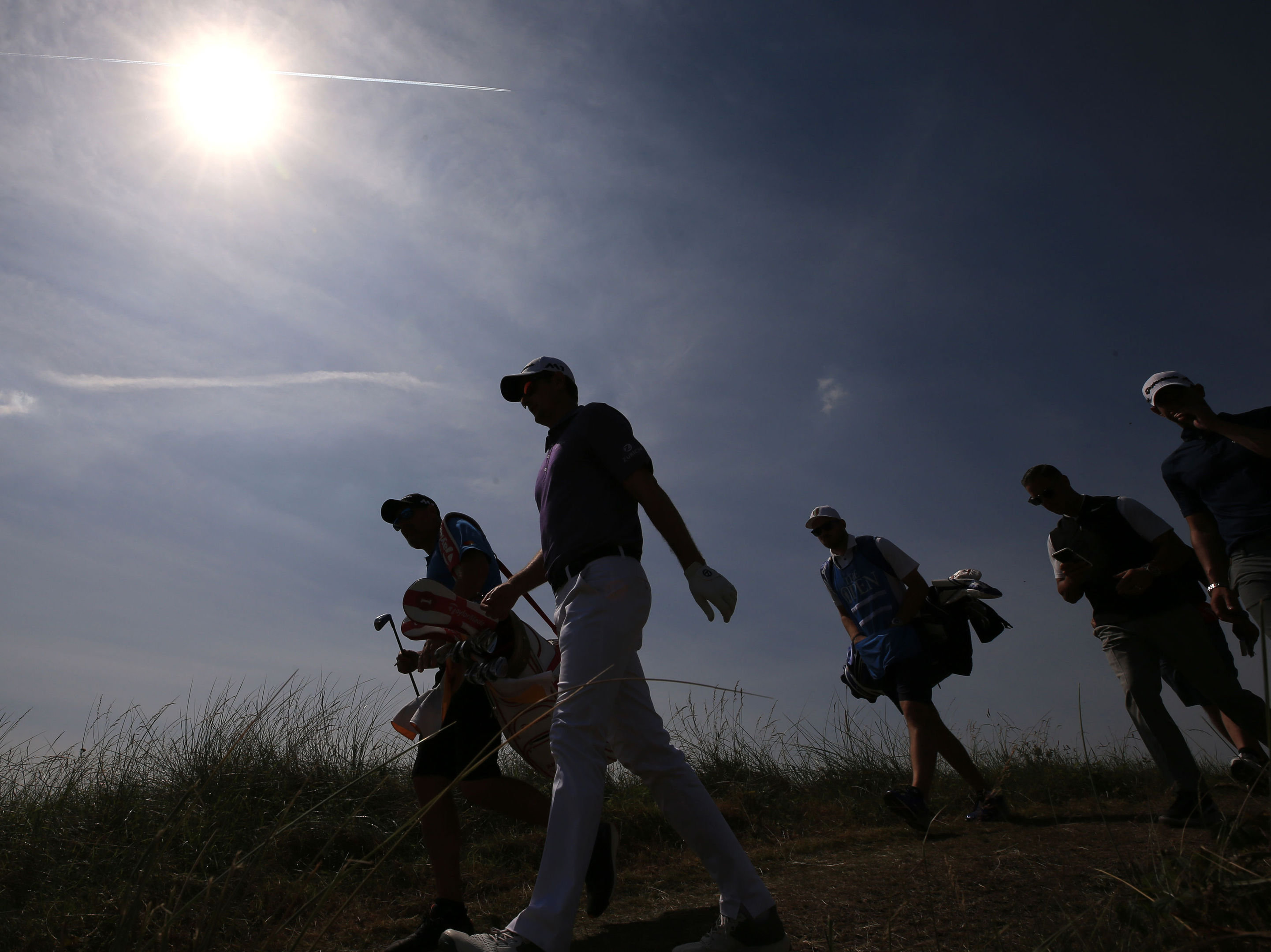 Justin Rose steps out in glorious sunshine in practice for the Open at Royal Birkdale.