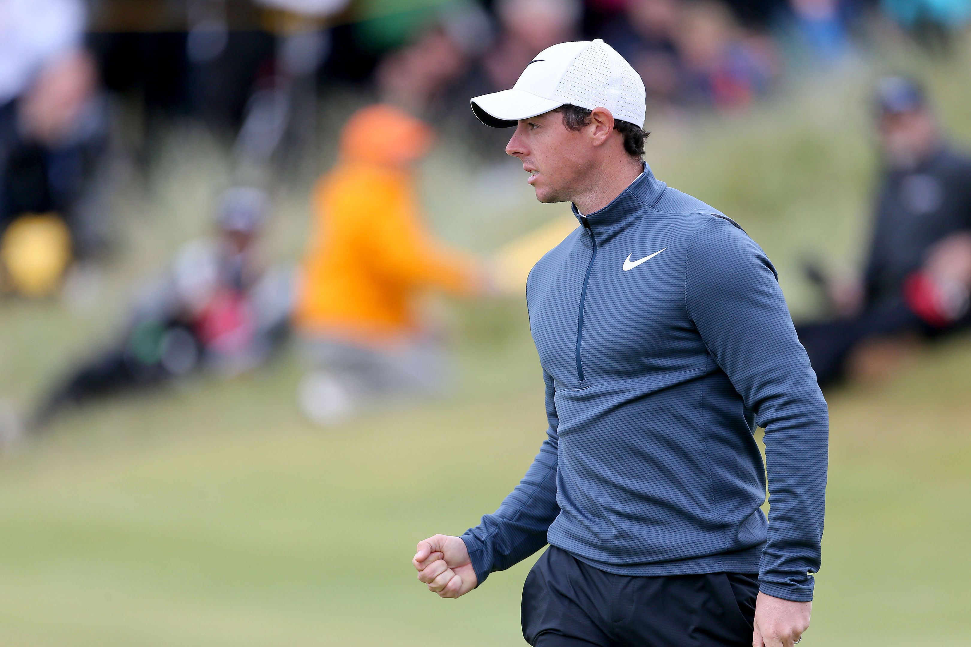 Rory McIlroy makes another putt during his second round 68 at Royal Birkdale.