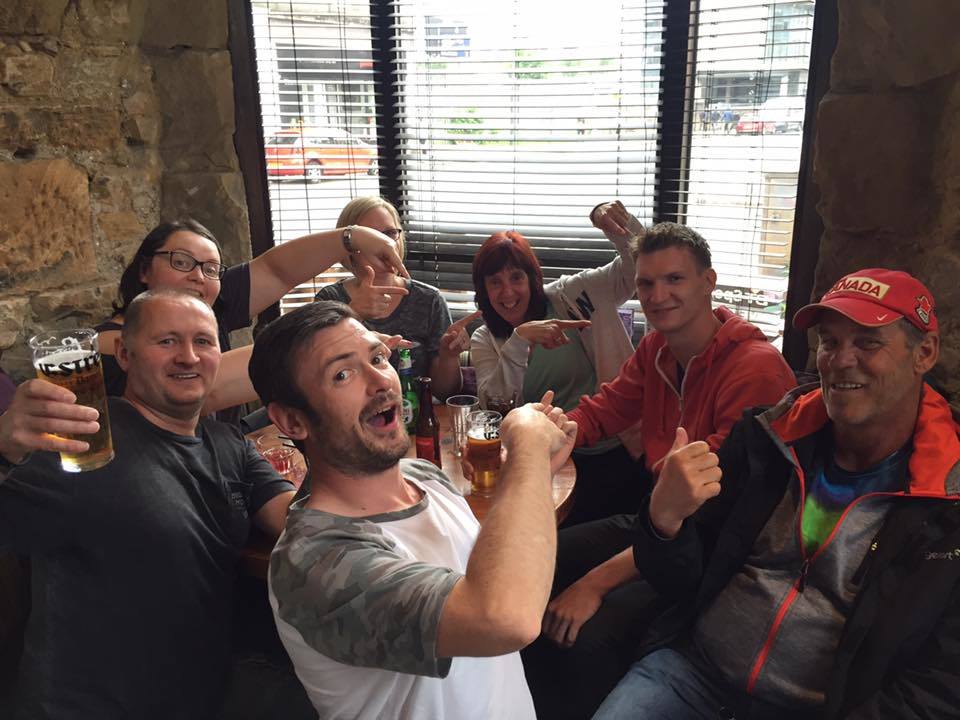 Green Day fan Bart van Aalst enjoys a pint with punters in Glasgow. Credit: Gary MacCluskey.