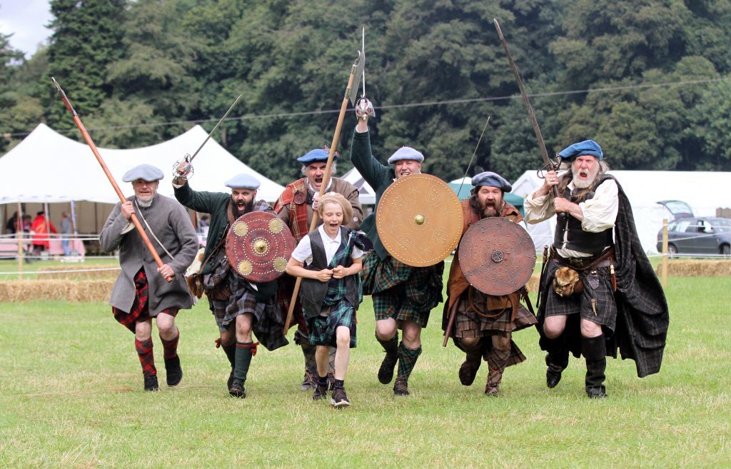 10 year old Hamish Dunnigan from Kinloch Rannoch leads the Jacobites on a charge on Saturday.