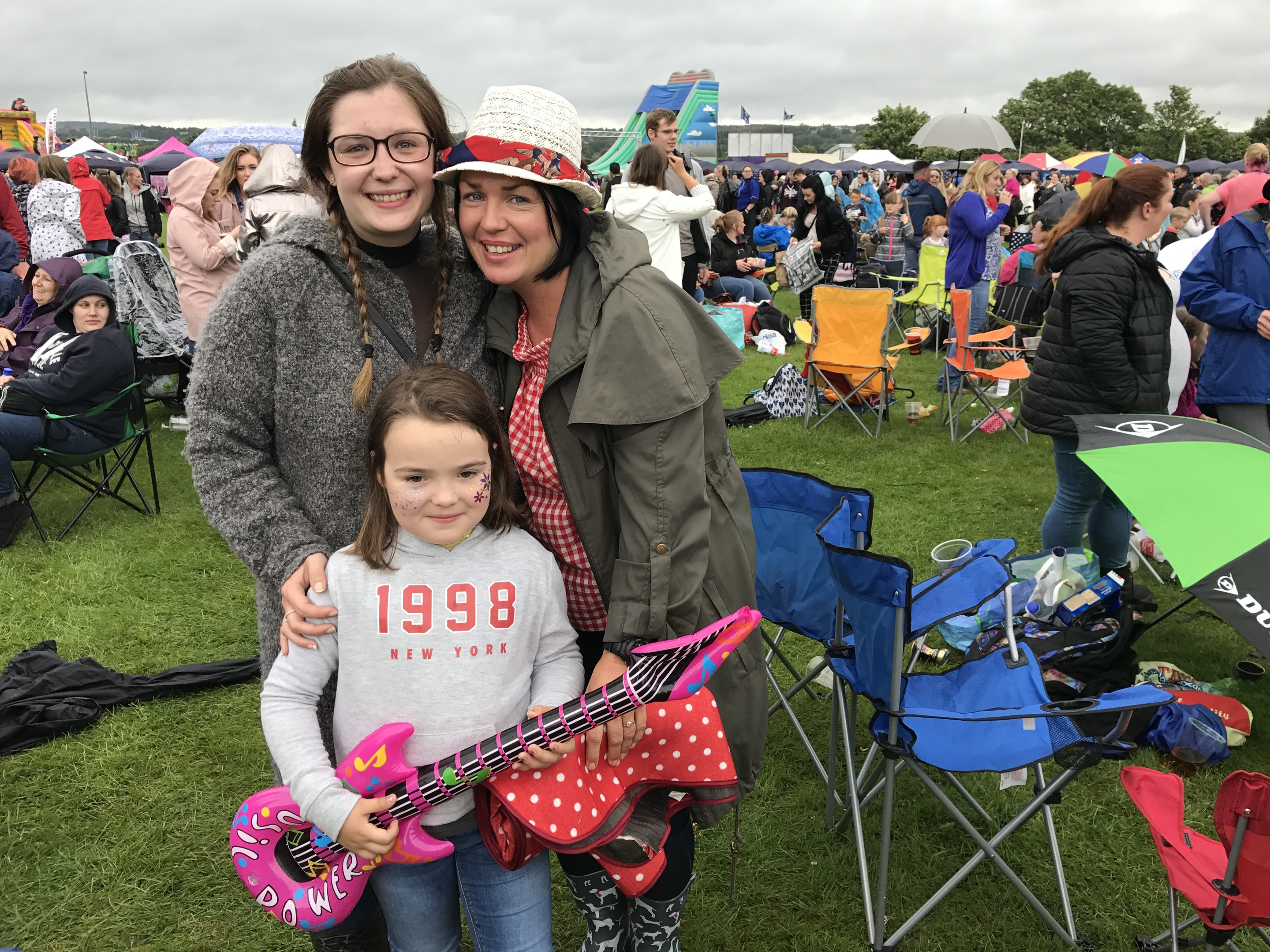 Chloe, Suzanne and Maisie ignore the rain