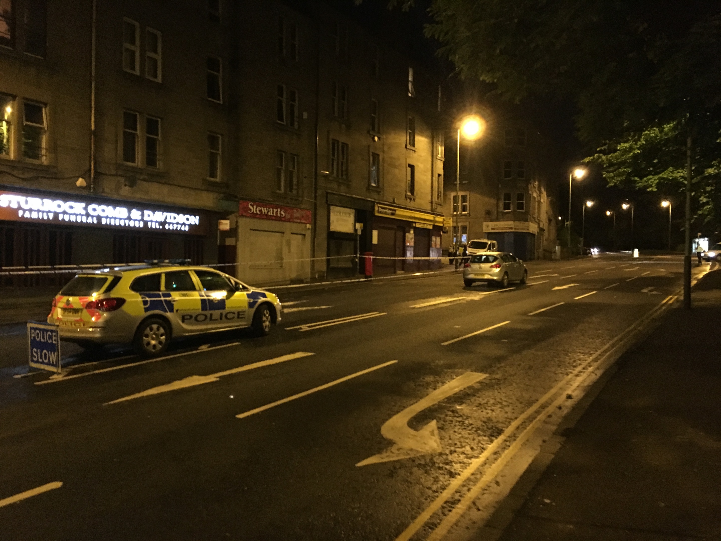 Police cordoned off part of Lochee Road.