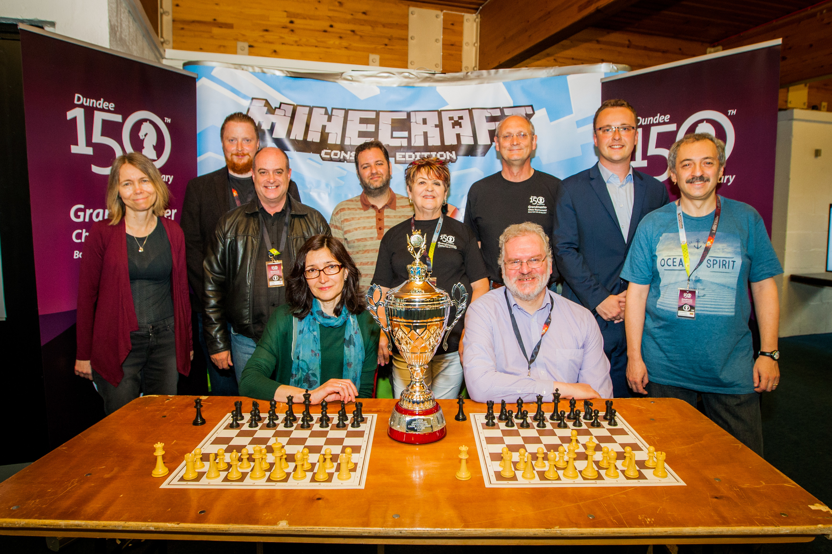 Event organiser Jean Chalmers in the centre alongside most of the Chess Grandmasters playing in the event