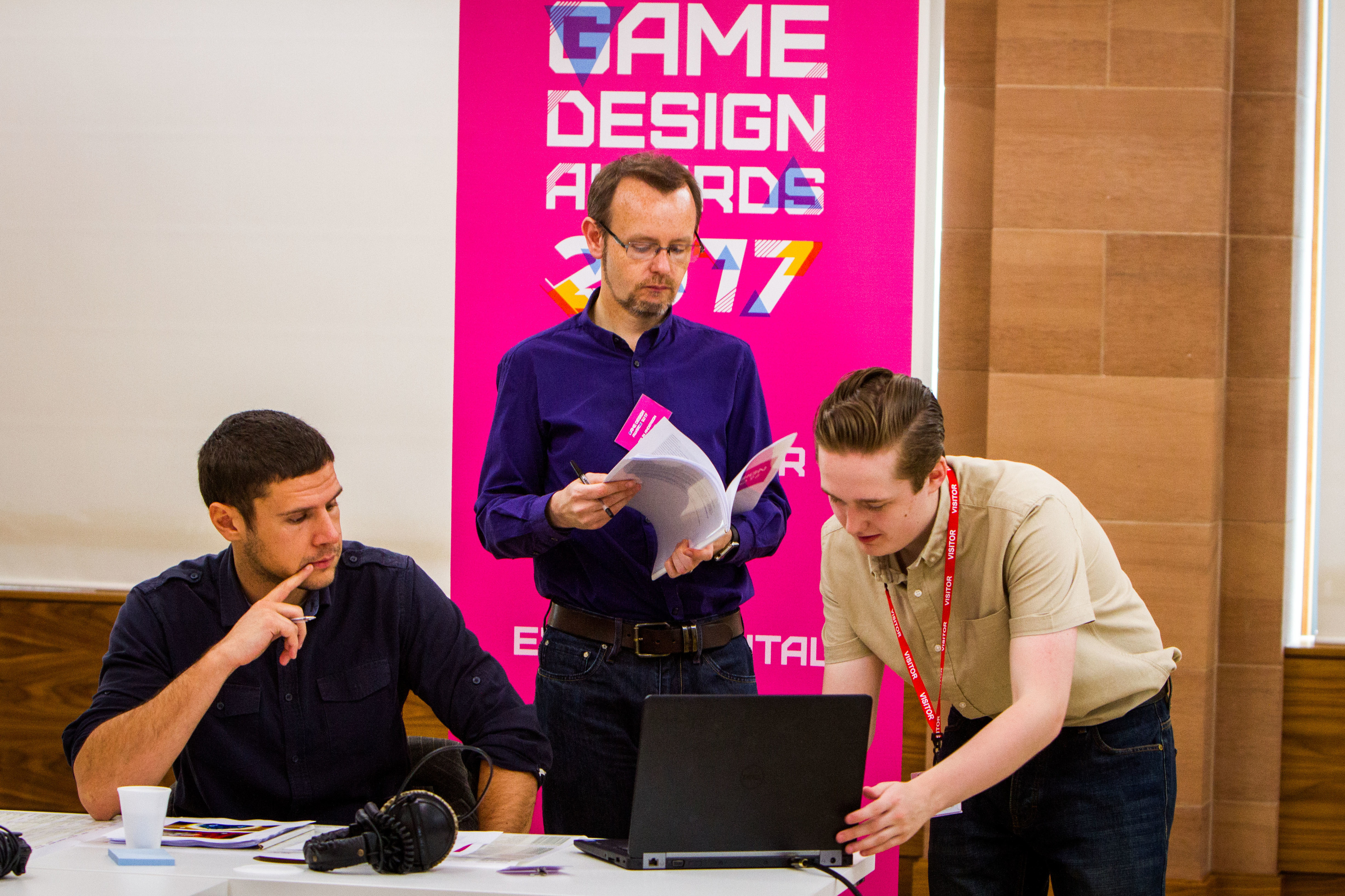 Christos Michalakos of Abertay University, Denki managing director Colin Anderson and Blair Flight of DC Thomson during the judging.