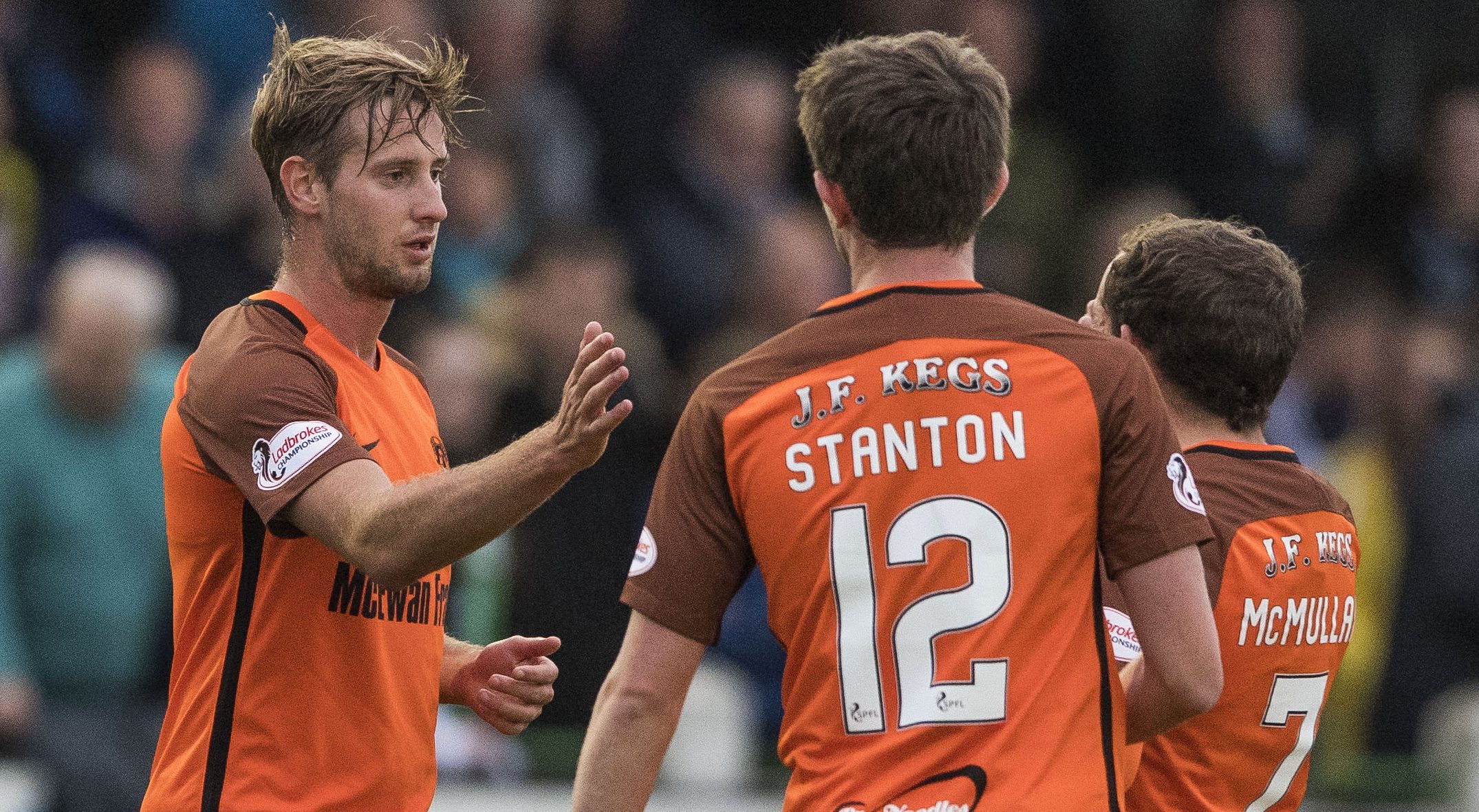 Billy King celebrates his goal against Buckie with his team-mates.