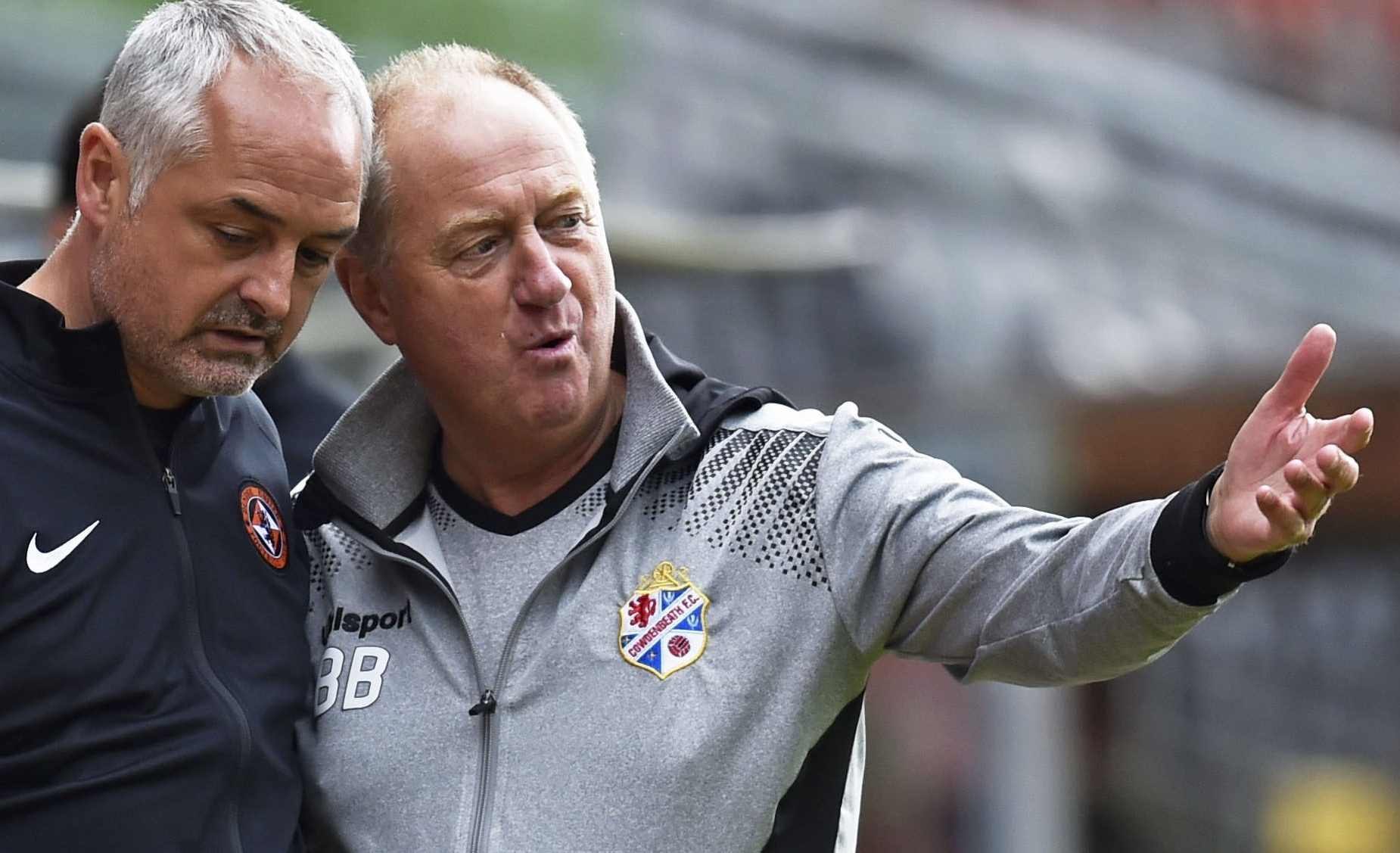 United boss Ray McKinnon and Billy Brown.