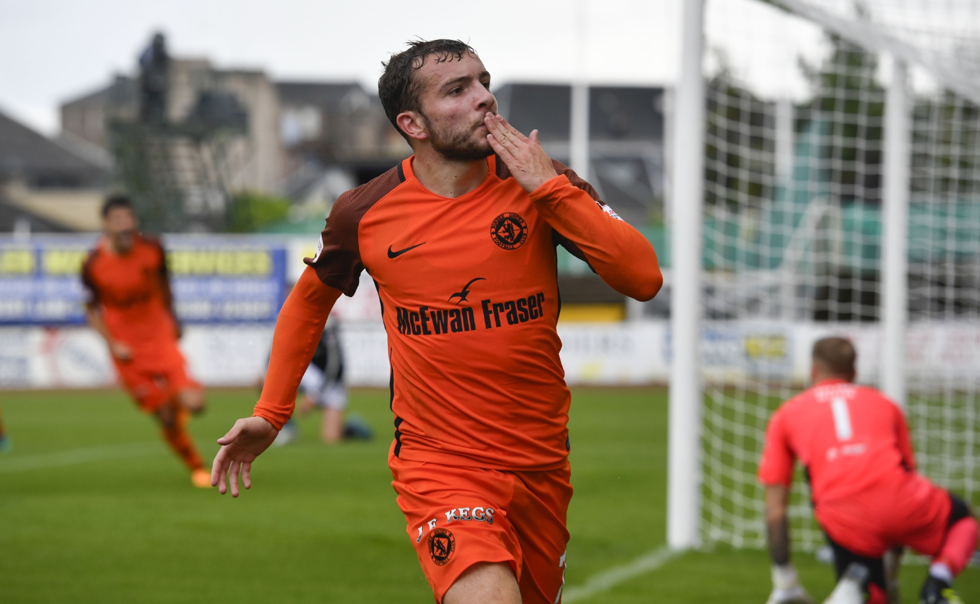 Paul McMullan celebrates his goal against Dundee.