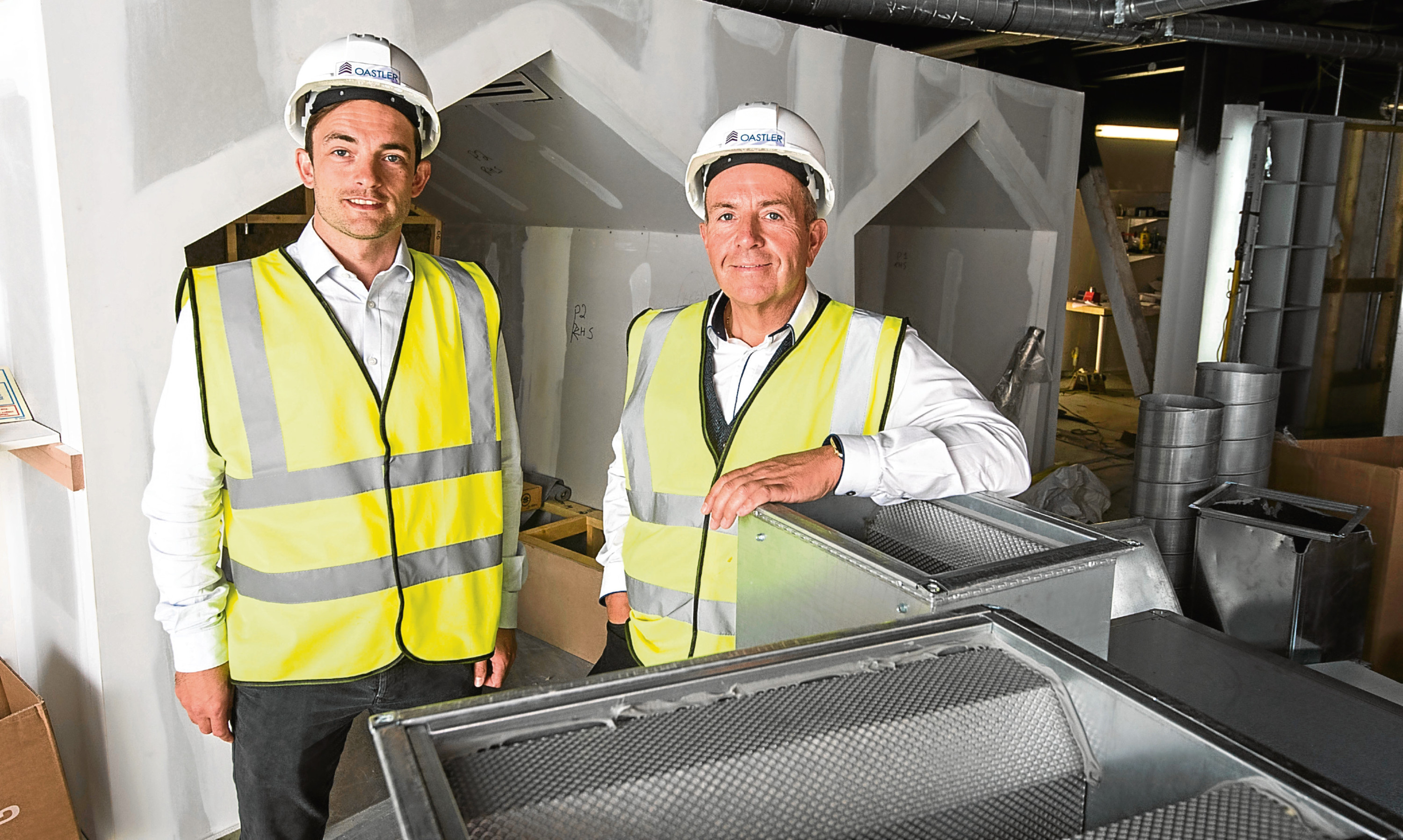 Brian McNicoll, enterprise and entrepreneurship manager at Dundee University with Professor Gary McEwan at the soon-to-be completed Elevator hub in Dundee.