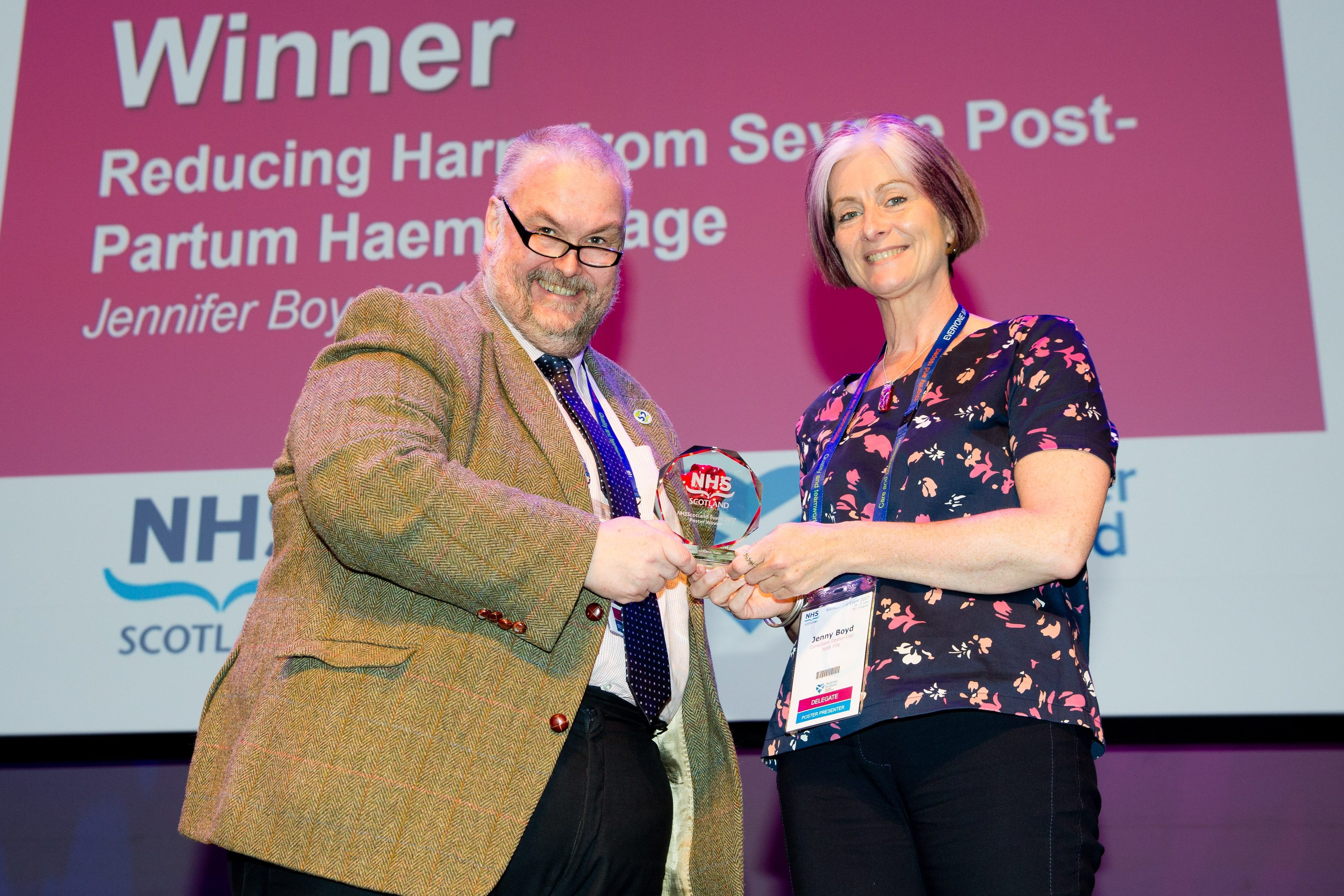 Dr Boyd accepting the  Safe Award from Paul Gray, chief executive of NHS Scotland and director general of health and social care.