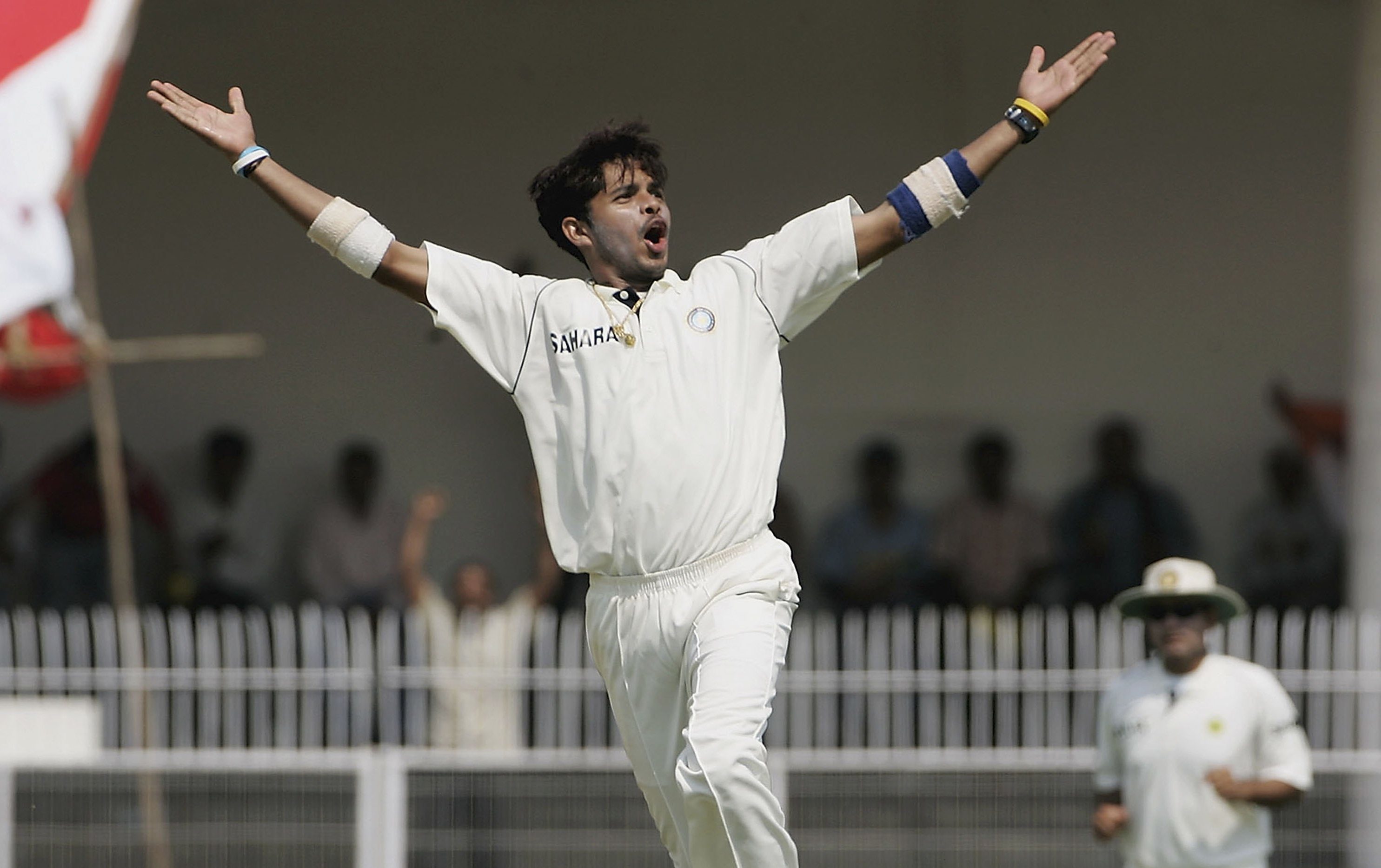 Sreesanth of India celebrates taking the wicket of Andrew Strauss of England during day one of the First Test between India and England at the VCA Stadium on March 1, 2006 in Nagpur, India.