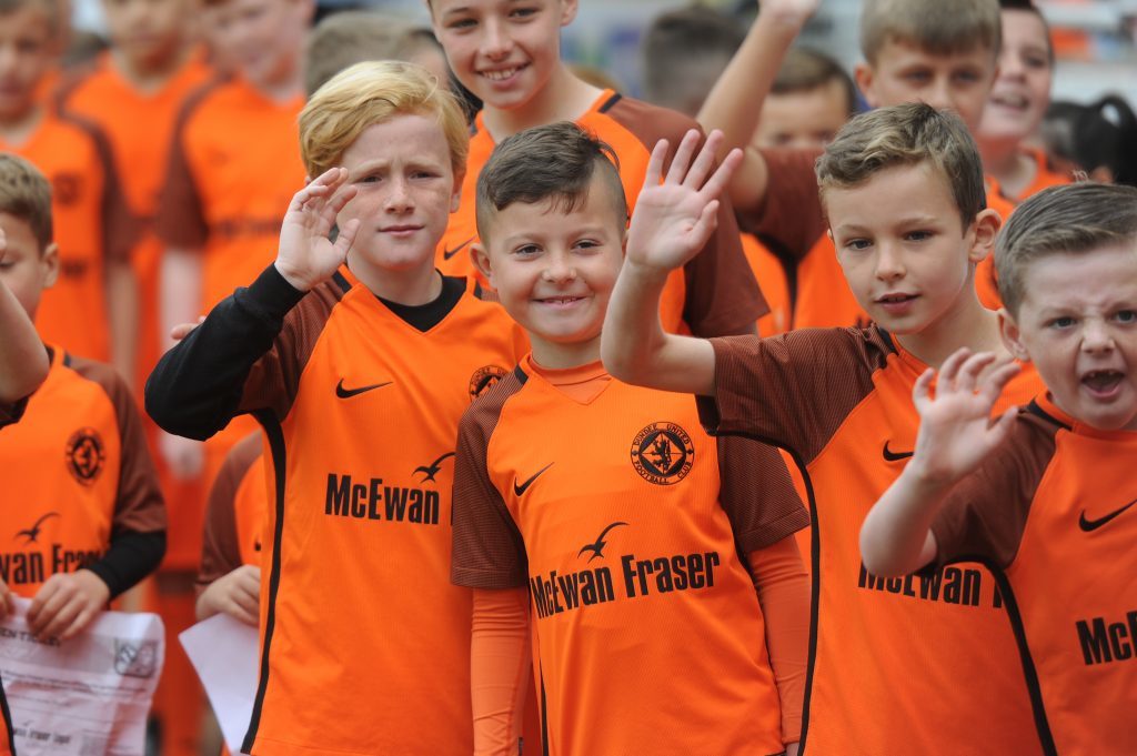 Young fans before the match at Tannadice.